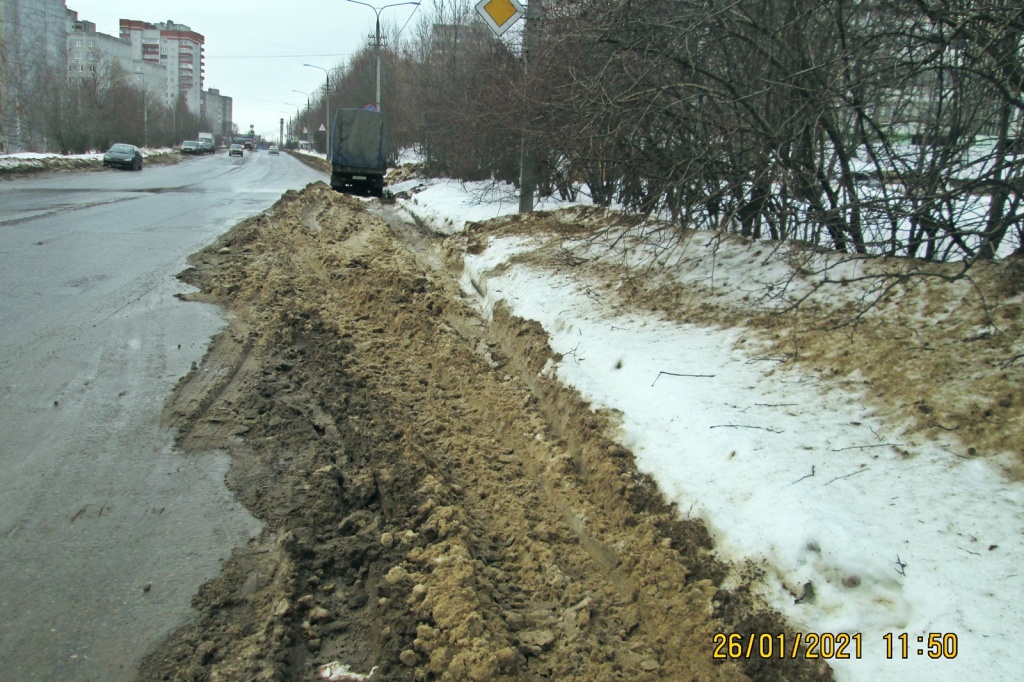 Проезжая часть не очищена от снега, ул. Н. Дуброва 24.JPG